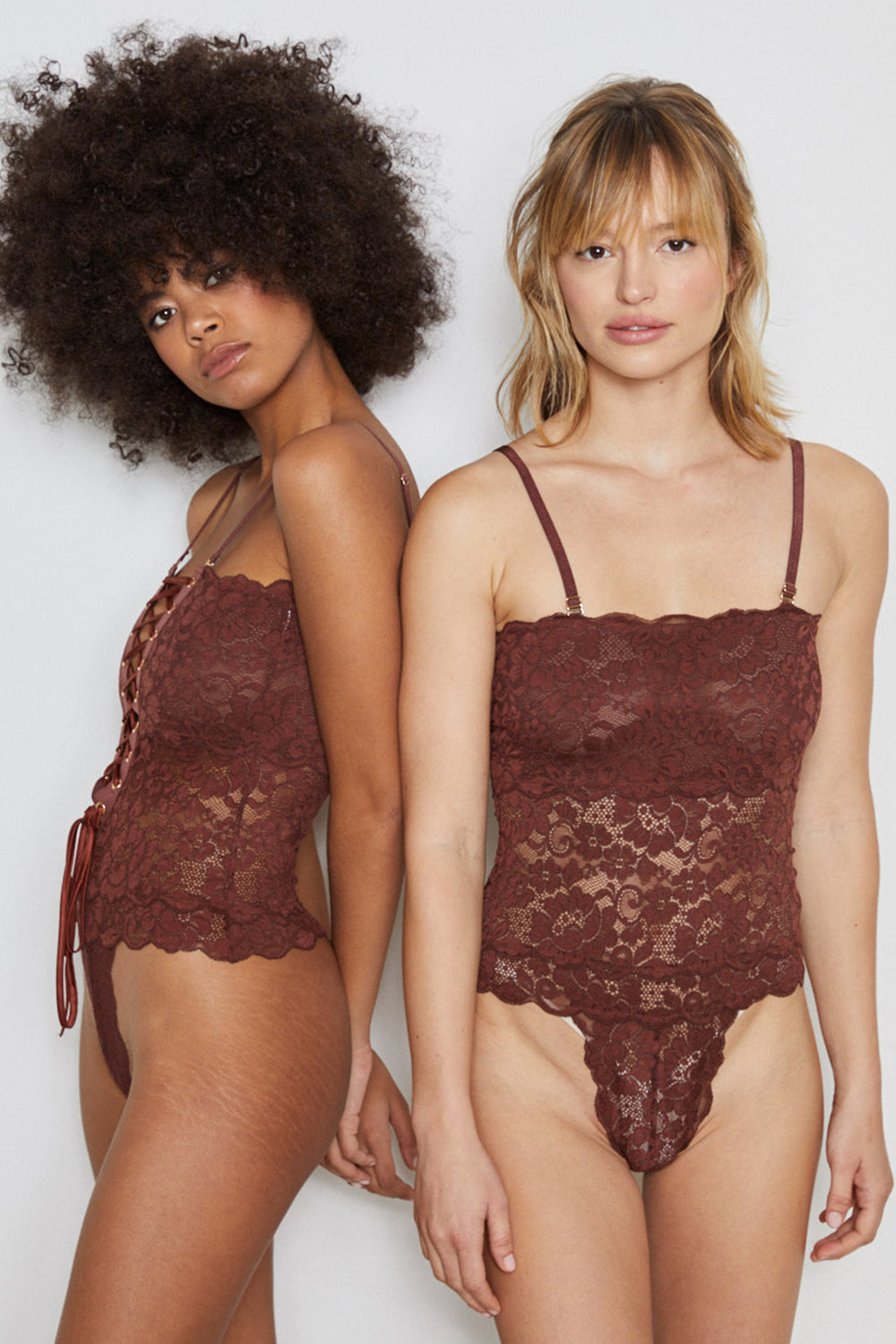 Brown lace-up reversible lingerie bodysuit made of stretch lace. | Models are wearing Size S